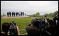 Photographers train their lenses on the G-8 leaders Tuesday, July 8, 2008, as they pose for the official family photograph in Toyako, Japan. In the background is Lake Toya. White House photo by Eric Draper