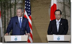 President George W. Bush and Japan's Prime Minister Yasuo Fukuda listen to questions from the audience during a joint press availability Sunday, July 6, 2008, at the Windsor Hotel Toya Resort and Spa. Japan is host to this year's 2008 Group of Eight Summit.  White House photo by Eric Draper