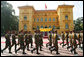 An honor guard passes by the Presidential Palace in Hanoi Friday, Nov. 17, 2006, during the arrival ceremony for President George W. Bush and Mrs. Laura Bush. White House photo by Paul Morse