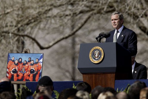 Speaking to the memory of the seven astronauts who lost their lives in Space Shuttle Columbia disaster, President George W. Bush addresses the nation's loss during a memorial service at the NASA Lyndon B. Johnson Space Center Tuesday, Feb. 4, 2003. 