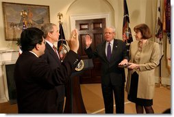 President George W. Bush presides over the swearing-in of William Donaldson as the new chairman of the Securities and Exchange Commission in the Roosevelt Room Tuesday, Feb. 18, 2003.  White House photo by Tina Hager