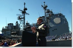  President George W. Bush speaks to sailors in front of the USS Philippine Sea at Naval Station Mayport in Mayport, Fla., Thursday, Feb. 13, 2003.  White House photo by Eric Draper