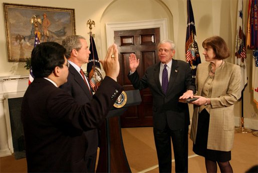 President George W. Bush presides over the swearing-in of William Donaldson as the new chairman of the Securities and Exchange Commission in the Roosevelt Room Tuesday, Feb. 18, 2003. White House photo by Tina Hager.