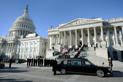 A military honor guard descends the steps of the Senate carrying the casket of former President Gerald R. Ford from the Capitol to an awaiting hearse, Tuesday, January 2, 2007, for the procession to the State Funeral at the National Cathedral in Washington, D.C. White House photo by David Bohrer