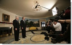 President George W. Bush and Robert Gates, the President's nominee for Secretary of Defense, stand before the press Tuesday morning, Dec. 5, 2006, in the Diplomatic Reception Room of the White House. Said the President, "Bob Gates will be a fine Secretary of Defense. I hope for a speedy confirmation so he can get sworn in and get to work." White House photo by Eric Draper