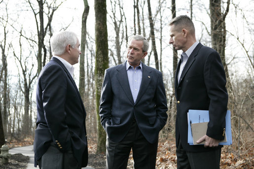 President George W. Bush discusses Iraq policy with Secretary of Defense Robert Gates, left, and Chairman of the Joint Chiefs of Staff General Peter Pace at Camp David, Saturday, Dec. 23, 2006. White House photo by Eric Draper