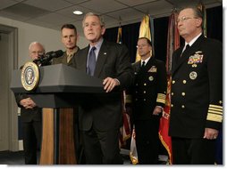 President George W. Bush listens to a reporter’s question following his meeting on Iraq with U.S military leaders at the Pentagon, Wednesday, Dec. 13, 2006, joined by from left, Vice President Dick Cheney; Chairman of the Joint Chiefs of Staff, General Peter Pace and Vice Chairman of the Joint Chiefs of Staff Admiral Edmund P. Giambastiani, right. White House photo by Eric Draper