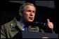 President George W. Bush speaks to troops during his visit to Fort Hood in Killeen, Texas, Friday, Jan. 3, 2003. "Our country is in a great contest of will and purpose. We're being tested. In times of crisis, we will act decisively," said the President in his remarks. "And in times of calm, we'll be focused and patient and relentless in our pursuit of the enemy. That's what we owe the American people." White House photo by Eric Draper.