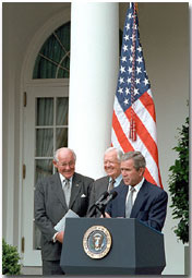President Bush, former President Jimmy Carter and House Minority Leader Bob Michel hold a press conference addressing election reform principles in the Rose Garden July 31, 2001. White House photo by Eric Draper.