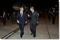 Arriving in London for a State Visit to the United Kingdom, President George W. Bush is greeted by Prince Charles at London Heathrow Airport Tuesday, Nov. 18, 2003. This State Visit is the first time an American President has visited as a guest of the Queen since President Reagan's visit in 1982.  White House photo by Eric Draper
