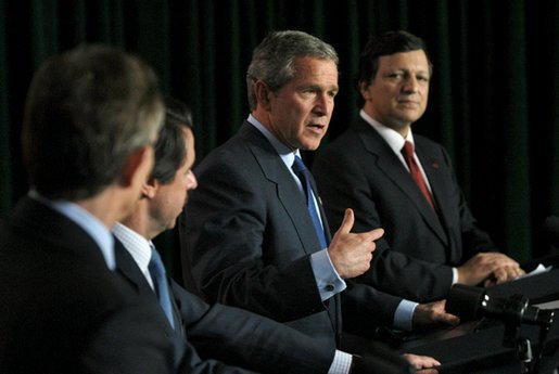President George W. Bush speaks during a news conference with, from left, Prime Minister of Great Britain Tony Blair, President of Spain Jose Maria Aznar and Prime Minister of Portugal Jose Manuel Durao Barroso in The Azores, Portugal, Sunday, March 16, 2003. White House photo by Eric Draper