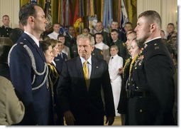 President George W. Bush attends a commissioning ceremony for Joint Reserve Officer Training Corps Thursday, May 17, 2007, in the East Room. "You come from different backgrounds; you represent all 50 states and the District of Columbia, as well as Guam, Puerto Rico, American Samoa and the U.S. Virgin Islands," said President Bush. "And when you leave here today, you will wear on your shoulders the same powerful symbol of achievement: the gold bars of an officer of the United States Armed Forces." White House photo by Joyce N. Boghosian