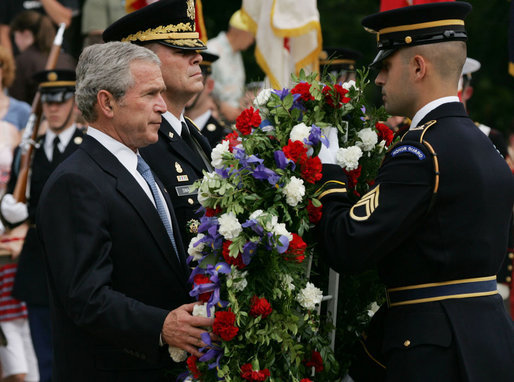 President George W. Bush is joined by Major General Guy Swan III, left, commander of the Military District of Washington, during the Memorial Day commemoration wreath laying ceremony at the Tomb of the Unknowns Monday, May 28, 2007, at Arlington National Cemetery in Arlington, VA. White House photo by Chris Greenberg
