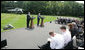 President George W. Bush and British Prime Minister Gordon Brown address the press Monday, July 30, 2007, at Camp David near Thurmont, Md. White House photo by Eric Draper