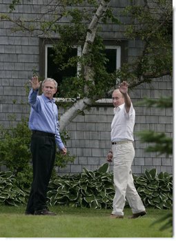President George W. Bush and Russia's President Vladimir Putin wave as they leave a press availability Monday, July 2, 2007, at Walker's Point in Kennebunkport, Me.  White House photo by Joyce N. Boghosian