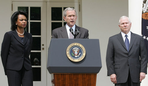 Flanked by U.S. Secretary of State Condoleezza Rice and U.S. Secretary of Defense Robert Gates, President George W. Bush delivers a statement in the Rose Garden Wednesday, Aug. 13, 2008, regarding efforts by the United States to resolve the crisis in Georgia. White House photo by Joyce N. Boghosian