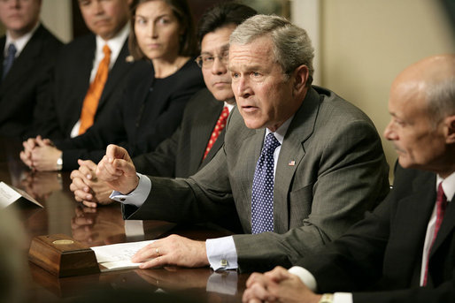 President George W. Bush meets with administration official and U. S. Attorneys to talk about the use and reauthorization of the PATRIOT Act in the Roosevelt Room Tuesday, Jan. 3, 2006. "This Patriot Act was passed overwhelmingly by the United States Congress in 2001," said the President in his remarks to the press. "Members from both parties came together and said we will give those on the front line of protecting America the tools necessary to protect American citizens, and at the same time, guard the civil liberties of our citizens." White House photo by Eric Draper