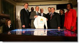 President George W. Bush and Chicago Mayor Richard Daley hold up a T-shirt touting Chicago 2016, during a meeting Monday, Jan. 7, 2008, with with members of the Chicago 2016 Bid Committee and the U.S. Olympic Committee. Said the President, "This country supports your bid, strongly. And our hope is that the judges will take a good look at Chicago and select Chicago for the 2016 Olympics." White House photo by Joyce N. Boghosian