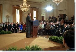 President George W. Bush calls on the Senate to support a ban on human cloning during an address in the East Room Wednesday, April 10. "Our age must also be defined by the care and restraint and responsibility with which we take up these new scientific powers," said the President. "Advances in biomedical technology must never come at the expense of human conscience." White House photo by Paul Morse.