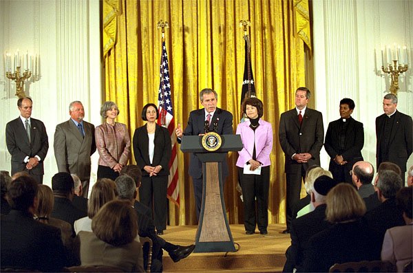 Introduced by Secretary of Labor Elaine Chao (pictured to the immediate right of the President), President George W. Bush addressed the audience during a ceremony for the Recovery and Empowerment Act, which aid charitable efforts, in the East Room Thursday, April 11. White House photo by Eric Draper.