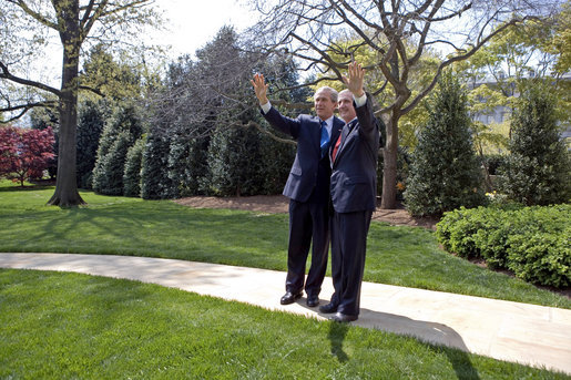 President George W. Bush and White House Chief of Staff Andrew Card wave to the press Thursday, April 13, 2006. Friday is Secretary Card's last day as Chief. Former Deputy White House Chief of Staff Josh Bolten will assume Secretary Card's responsibilities. White House photo by Eric Draper