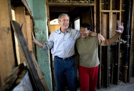 President George W. Bush shares a light moment with homeowner Ethel Williams during a visit to her hurricane damaged home in the 9th Ward of New Orleans, Louisiana, Thursday, April 27, 2006. White House photo by Eric Draper