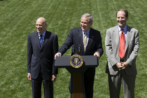 Addressing the press, President George W. Bush stands with Ed Lazear of the Council of Economic Advisors, left, and Al Hubbard of the National Economic Council, in the Rose Garden Friday, April 28, 2006. "I'm joined my two top White House economic advisors. The reason why is because we've had some very positive economic news today: the Commerce Department announced that our economy grew at an impressive 4.8 percent annual rate in the first quarter of this year. That's the fastest rate since 2003," said President Bush. "This rapid growth is another sign that our economy is on a fast track." White House photo by Eric Draper