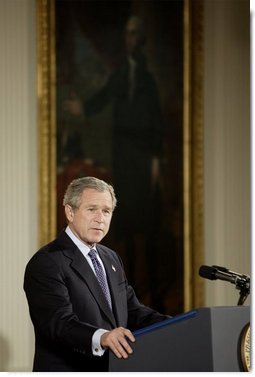President George W. Bush discusses his immigration policy in the East Room Wednesday, Jan. 7, 2004. "We must make our immigration laws more rational, and more humane. And I believe we can do so without jeopardizing the livelihoods of American citizens," said President Bush.  White House photo by Paul Morse