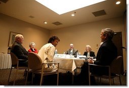 President George W. Bush meets with doctors and patients to talk about medical liability reform Baptist Health Medical Center in Little Rock, Ark., Monday, Jan. 26, 2004.  White House photo by Paul Morse