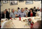 President George W. Bush is joined by Mississippi Governor Haley Barbour, left, as they attend a working luncheon with Mississippi community and housing officials at the Biloxi Schooner Restaurant to discuss the state’s recovery and rebuilding efforts Monday, Aug. 28, 2006 in Biloxi, Miss., on the one-year anniversary of Hurricane Katrina. White House photo by Eric Draper