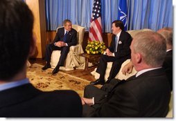 President George W. Bush with NATO Secretary General Lord Robinson at Practica di Mare Air Force base Near Rome, Italy on May 28, 2002. White House photo by Paul Morse.
