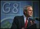 President George W. Bush answers reporters questions during a press conference following the G8 Summit in Savannah, Georgia, Thursday, June 10, 2004. White House photo by Eric Draper.