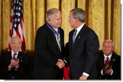Recipient of the Presidential Medal of Freedom Senator Edward William Brooke thanks President George W. Bush after receiving his award in the East Room of the White House on June 23, 2004.  White House photo by Paul Morse
