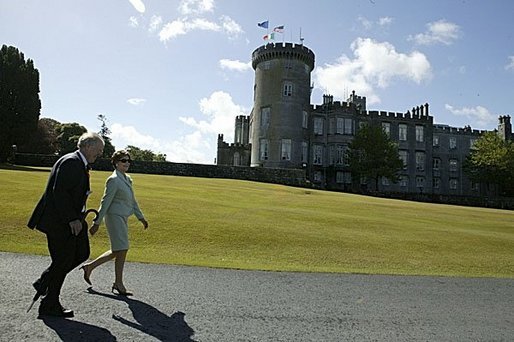 Laura Bush and Ireland’s Deputy Chief of Protocol Joe Brennan walk along the grounds of Dromoland Castle during a day of meetings between the United States and European Union in Shannon, Ireland, Saturday, June 26, 2004. White House photo by Joyce Naltchayan