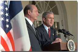 President George W. Bush and French President Jacque Chirac address the media in the Rose Garden Nov. 6. White House photo by Tina Hager.