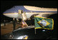 The Presidential limousine flies the flags of the United States and Brazil on the arrival of President George W. Bush and Mrs. Laura Bush to Guarulhos International Airport aboard Air Force One in Sao Paulo, Brazil, March 8, 2007, the first stop in their week-long trip to Latin America. White House photo by Eric Draper