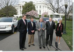 President George W. Bush talks to the media after a demonstration Monday, March 26, 2007, of alternative fuel vehicles on the South Lawn drive of the White House. Standing with him from left, are: Rick Wagoner, Chairman and CEO, General Motors Corporation; Alan Mulally, President and CEO, Ford Motor Company; Tom LaSorda, President and CEO, DaimlerChrysler Corporation, and Secretary of Transportation Mary Peters. White House photo by Joyce N. Boghosian