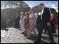 Mrs. Laura Bush joins Mrs. Maria Auxiliadora Delgado de Vazquez, in brown, wife of Uruguay's President Tabare Vazquez, during a walking tour Saturday, March 10, 2007, of the historic Portuguese settlement Colonia del Sacramento. White House photo by Shealah Craighead