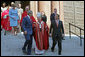 President George Bush walks out of St. Matthew's Cathedral with Theodore Cardinal McCarrick and Supreme Court Chief Justice John Roberts after attending the 52nd Annual Red Mass in Washington, DC, Sunday, October 2, 2005. The Red Mass, a historical tradition within the Catholic Church, is held on the Sunday before the opening session of the Supreme Court. White House photo by Shealah Craighead