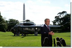 President George W. Bush delivers a statement on Iraqi elections after returning to the White House from Camp David, Sunday,Oct. 16, 2005. White House photo by Krisanne Johnson