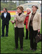 Mrs. Laura Bush blows a whistle to start the 100-meter wheelchair race Sunday, April 6, 2008, during her visit with the Russian Paralympic Team at Central Sochi Stadium in Sochi, Russia. White House photo by Shealah Craighead