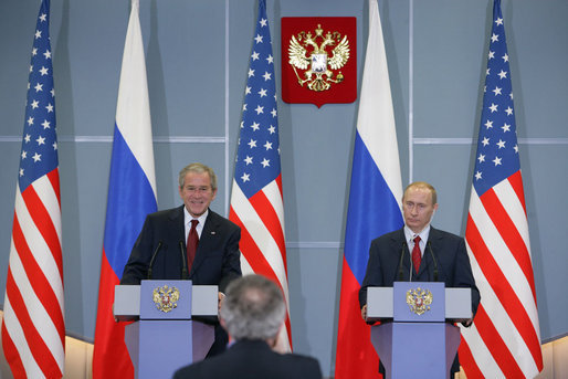 President George W. Bush and President Vladimir Putin smile as they respond to a reporter’s question Sunday, April 6, 2008, during a joint press availability in Sochi, Russia. White House photo by Chris Greenberg