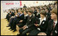 President George W. Bush and Mrs. Laura Bush applaud as they watch a skit sponsored by PEPFAR on HIV/AIDS performed by students at School 57 Tuesday, April 1, 2008, in Kyiv, Ukraine. White House photo by Shealah Craighead