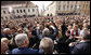 President George W. Bush reaches out to the crowd Saturday during his visit to St. Mark's Square in Zagreb. More than 3,000 people were on hand to welcome the President during his visit. White House photo by Eric Draper