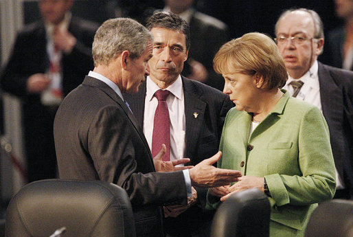 President George W. Bush joins Danish Prime Minister Anders Fogh Ransmussen and German Chancellor Angela Merkel Thursday, April 3, 2008, prior to the start of the afternoon's NATO Summit Meeting on Afghanistan in Bucharest. White House photo by Eric Draper