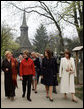 Mrs. Laura Bush walks with the spouses of NATO leaders Thursday, April 3, 2008, at the open-aired Dimitrie Gusti Village Museum in Bucharest. With her are Maria Basescu, right, spouse of Romania’s President Traian Basescu, and Alexandra Coman, fiancé of Romania’s Foreign Minister Adrian Cioroianu. White House photo by Shealah Craighead