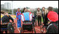 Mrs. Laura Bush visits with members of the Russian Paralympic Team Sunday, April 6, 2008, during a visit to Central Sochi Stadium in Sochi, Russia. White House photo by Shealah Craighead