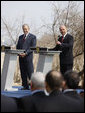 President George W. Bush smiles as he listens to a response to a reporter’s question by President Traian Basescu of Romania, during a joint press availability Wednesday, April 2, 2008, at the presidential retreat in Neptun, Romania. White House photo by Eric Draper