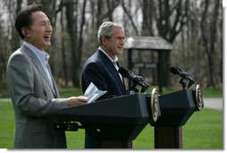 South Korean President Lee Myung-bak laughs as President George W. Bush speaks of President Lee's nickname the "Bulldozer" during a joint press availability Saturday, April 19, 2008, at the Presidential retreat at Camp David, Md. During his remarks, President Bush said, "President Lee is the first Korean President to visit Camp David. And I don't know if the American citizens understand your nickname -- you're known as the "Bulldozer." He said to make sure that it was a bulldozer with a computer. And the reason why is this is a man who takes on big challenges and he doesn't let obstacles get in the way. I like his spirit, I like his candor, and I like his optimistic vision. But most of all I really appreciate his values." White House photo by Shealah Craighead