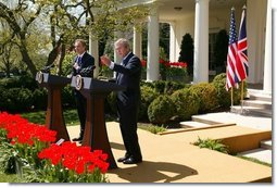 President George W. Bush and Prime Minister Tony Blair hold a press conference in the Rose Garden of the White House on April 16, 2004.  White House photo by Paul Morse